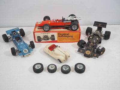 Lot 170 - A group of SCHUCO clockwork cars comprising 3x...