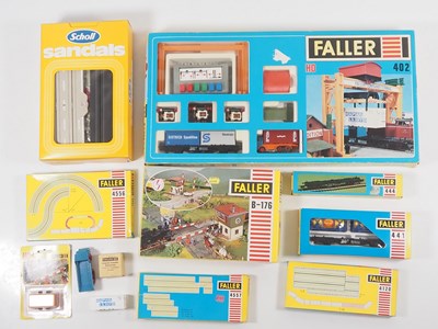 Lot 288 - A group of HO gauge FALLER AMS motorised...