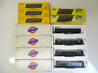 Lot 91 - HO SCALE MODEL RAILWAYS: A group of German...