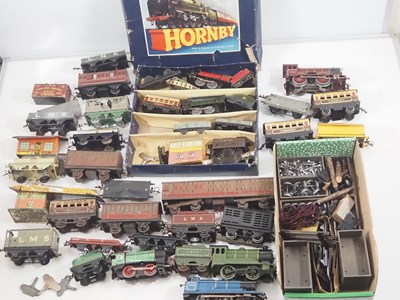 Lot 538 - A very large collection of O gauge clockwork...