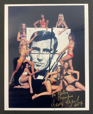 Lot 525 - A signed promotional composition of James Bond...