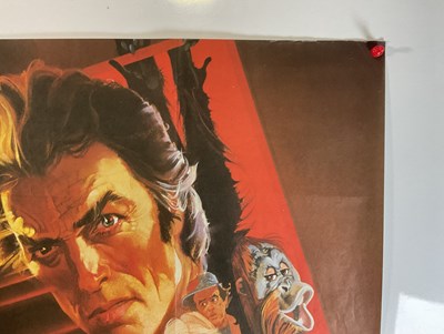 Lot 94 - CLINT EASTWOOD: A group of film posters...
