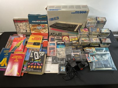 Lot 497 - A boxed ATARI 800 XL with a large quantity of...