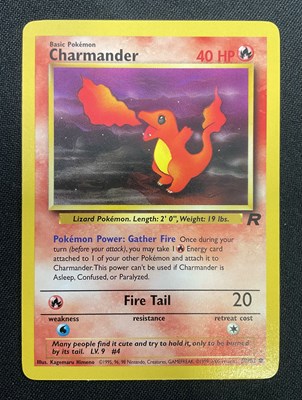 Lot 483 - POKÉMON - Dark Charizard evolution set...