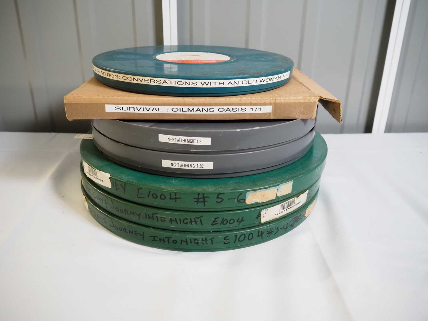 Lot 554 - A group of 16MM film reels comprising WORLD IN...