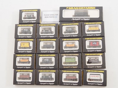 Lot 13 - A group of GRAHAM FARISH N gauge wagons in...