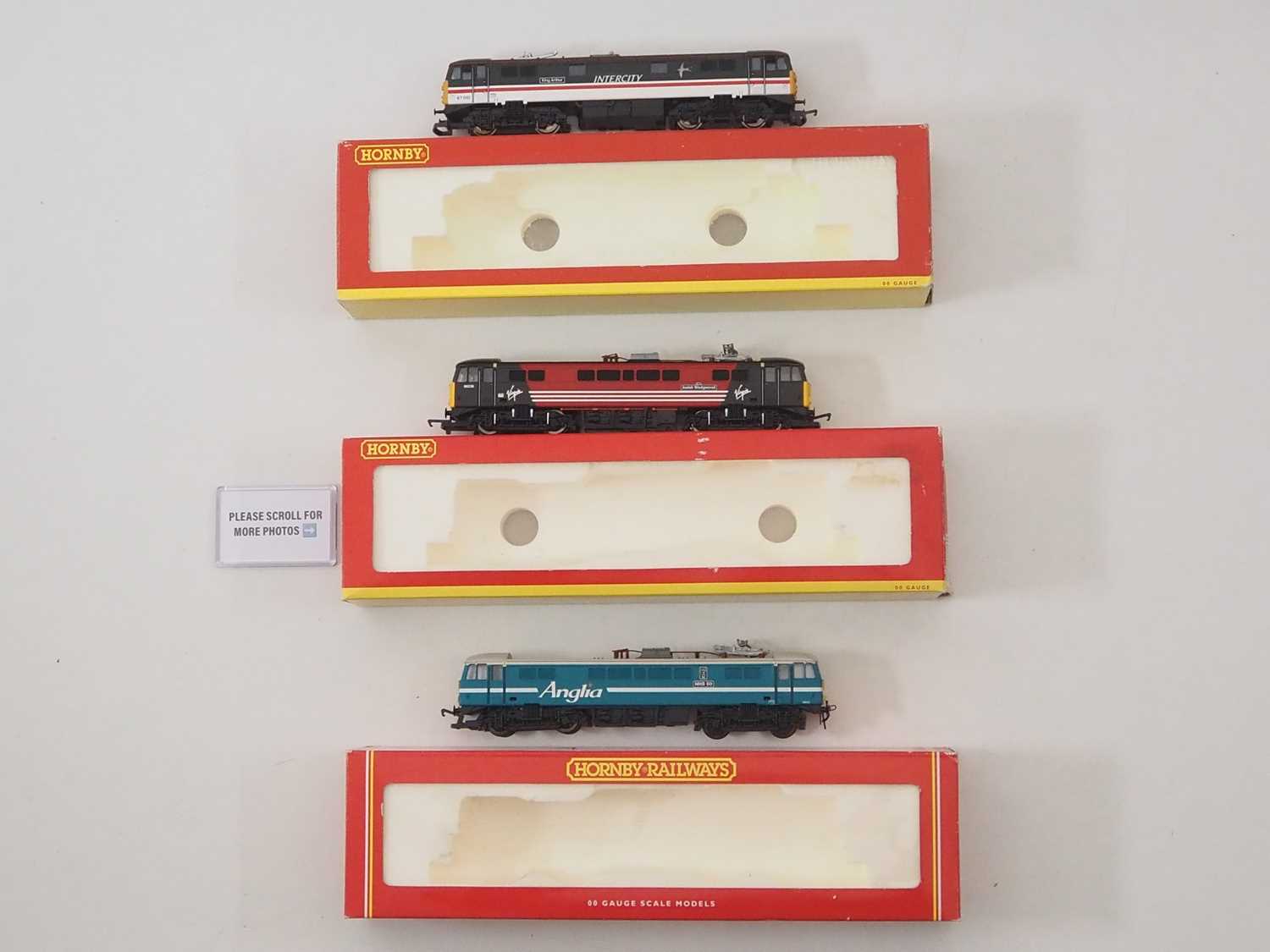 Lot 91 - A group of HORNBY OO gauge electric...