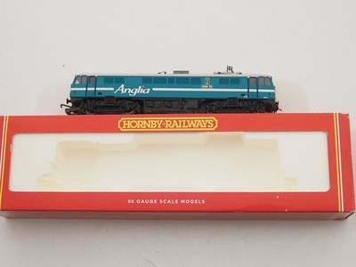 Lot 91 - A group of HORNBY OO gauge electric...
