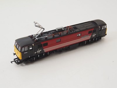 Lot 91 - A group of HORNBY OO gauge electric...