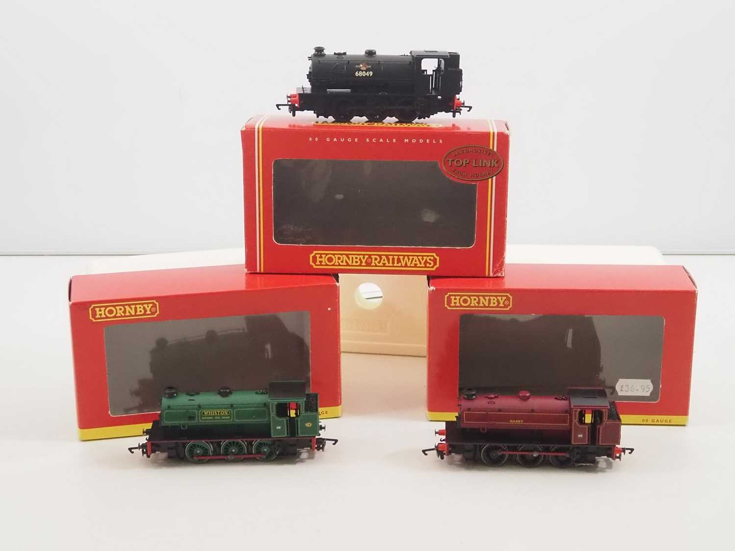 Lot 223 - A group of HORNBY OO gauge Class J94 steam...
