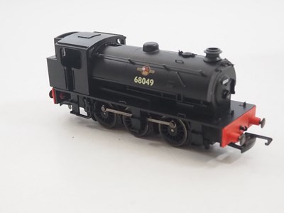 Lot 223 - A group of HORNBY OO gauge Class J94 steam...
