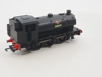 Lot 223 - A group of HORNBY OO gauge Class J94 steam...