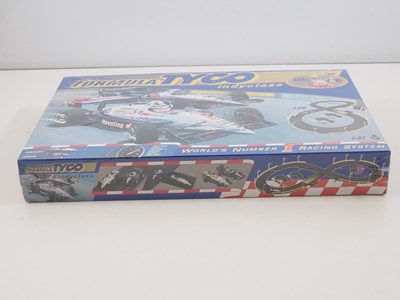 Lot 336 - A TYCO TOYS Formula TYCO, Nigel Mansell,...