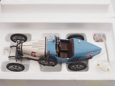 Lot 465 - A CMC M-100-013 1/18 scale diecast Bugatti...