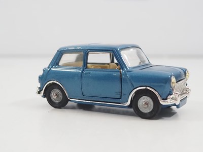 Lot 519 - A CORGI 334 diecast Mini-Cooper 'Magnifique'...