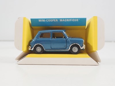 Lot 519 - A CORGI 334 diecast Mini-Cooper 'Magnifique'...