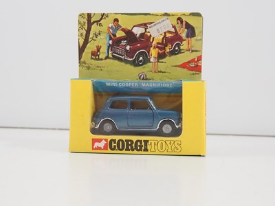 Lot 519 - A CORGI 334 diecast Mini-Cooper 'Magnifique'...