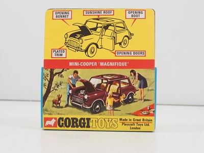 Lot 519 - A CORGI 334 diecast Mini-Cooper 'Magnifique'...