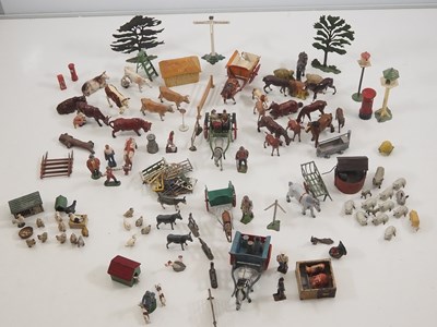 Lot 583 - A large quantity of diecast farm animals,...