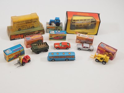 Lot 585 - A group of mostly boxed diecast vehicles by...