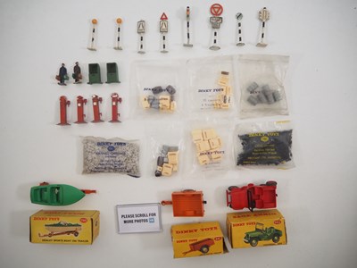 Lot 591 - A group of boxed DINKY vehicles together with...