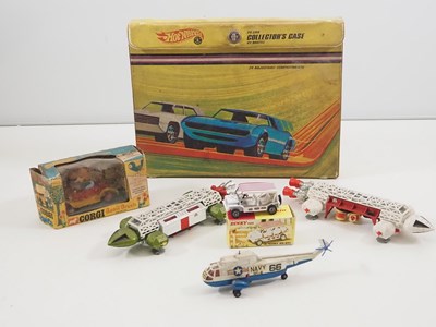 Lot 594 - A mixed group of playworn diecast toys to...