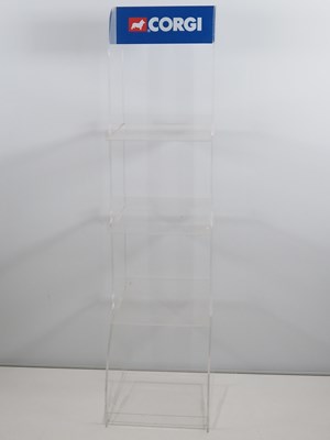 Lot 606 - A CORGI JUNIORS Clear Perspex shop display...