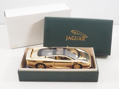 Lot 629 - A MAISTO 22ct 1:18 Scale gold plated diecast...