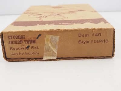Lot 663 - A CORGI JUNIORS / REEVES INTERNATIONAL scarce...