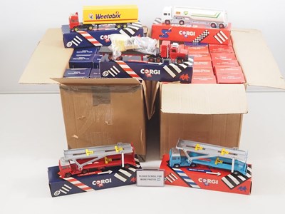 Lot 677 - A pair of CORGI trucks trade boxes comprising...
