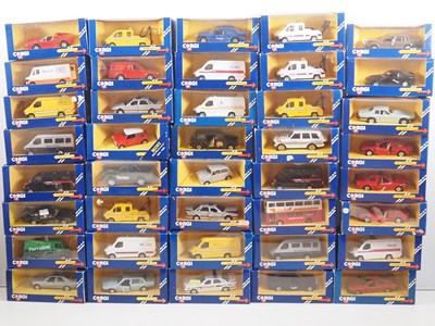 Lot 694 - A mixed group of CORGI diecast cars and vans...