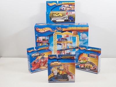 Lot 709 - A group of MATTEL Hotwheels sets to include a...