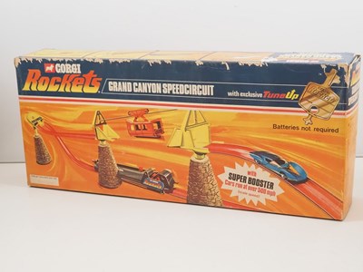 Lot 738 - A pair of CORGI ROCKETS track sets, each with...