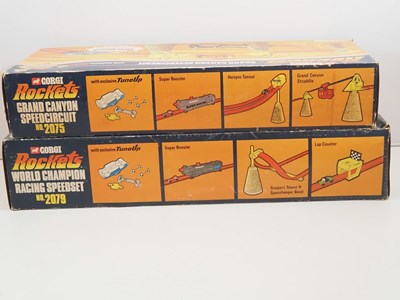 Lot 739 - A pair of CORGI ROCKETS track sets, each with...
