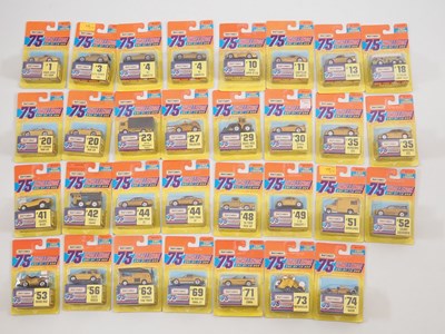 Lot 742 - A group of MATCHBOX USA carded diecast gold...