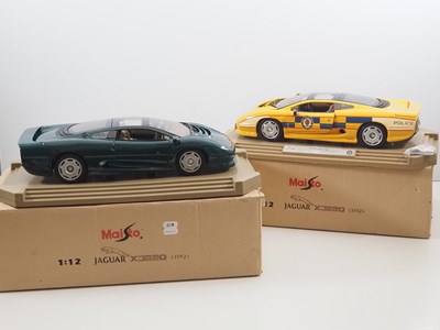 Lot 747 - A pair of MAISTO 1:12 scale diecast Jaguar...
