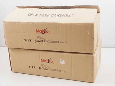 Lot 747 - A pair of MAISTO 1:12 scale diecast Jaguar...