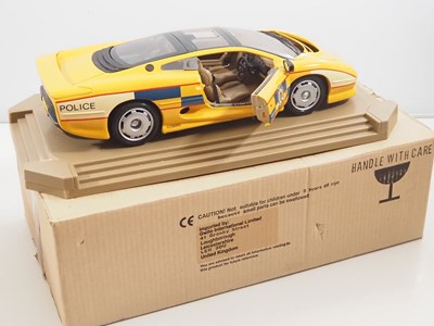 Lot 747 - A pair of MAISTO 1:12 scale diecast Jaguar...