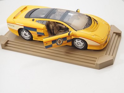 Lot 747 - A pair of MAISTO 1:12 scale diecast Jaguar...