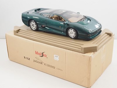 Lot 747 - A pair of MAISTO 1:12 scale diecast Jaguar...