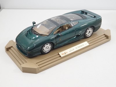 Lot 747 - A pair of MAISTO 1:12 scale diecast Jaguar...