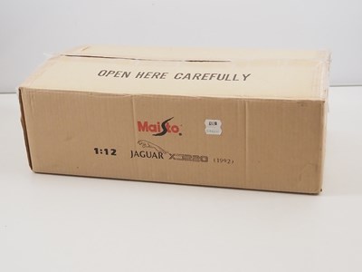 Lot 747 - A pair of MAISTO 1:12 scale diecast Jaguar...