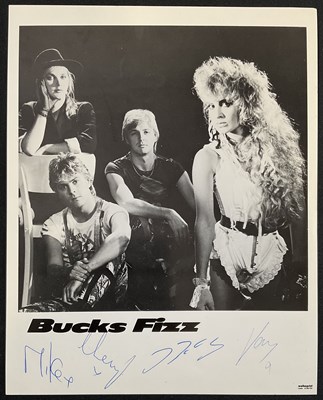 Lot 486 - A group of band signed promotional photographs...