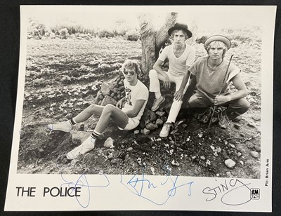 Lot 486 - A group of band signed promotional photographs...
