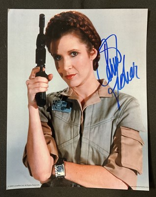 Lot 475 - STAR WARS - An 8" x 10" still of Princess Leia...