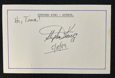 Lot 470 - STEPHEN KING - An autographed post card signed...