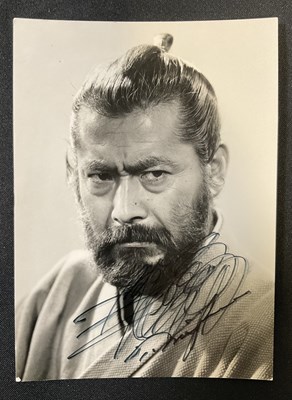 Lot 424 - TOSHIRO MIFUNE - An autographed black and...