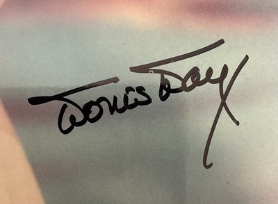 Lot 420 - DORIS DAY - An autographed 8" x 10" colour...