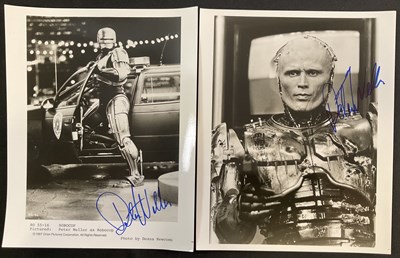 Lot 408 - ROBOCOP - A pair of black and white 8" x 10"...