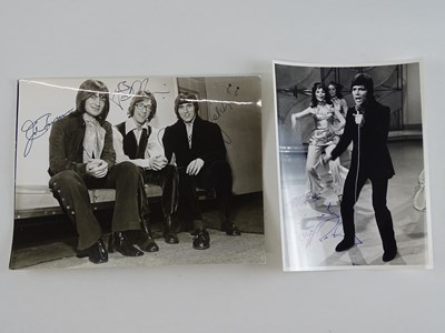 Lot 130 - A pair of black/white signed photographs...
